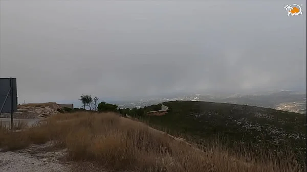 Crazy couple fucks on top of the mountain and cum on rented car