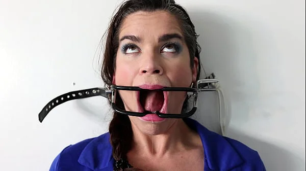 Extreme gag predicament - nailed to the wall