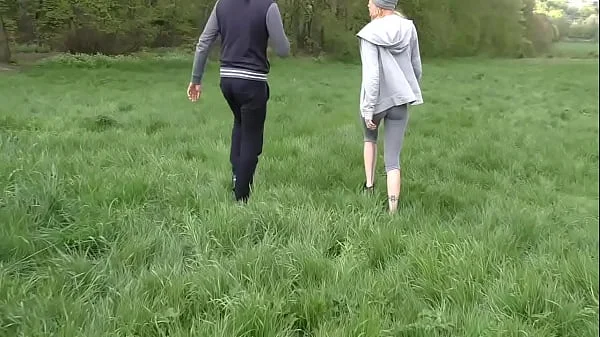 Young amateur interracial couple excited to be catched by voyeurs while an anal sex session in the woods