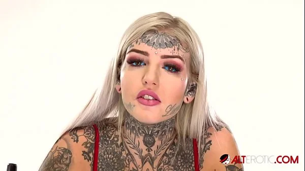 Behind the scenes for Amber Luke's new face tattoo