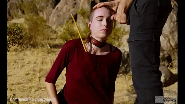 Petite, hardcore submissive masochist Brooke Johnson drinks piss, gets a hard caning, and get a severe facesitting rimjob session on the desert rocks of Joshua Tree in this Domthenation documentary